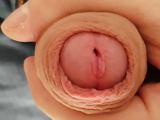 柄の Uncut Foreskin Closeup Cumshot